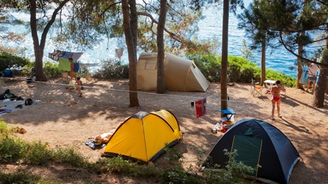 Camping site with tents near the sea