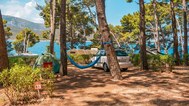 Camping area with a tent and hammock at Bijar near the sea